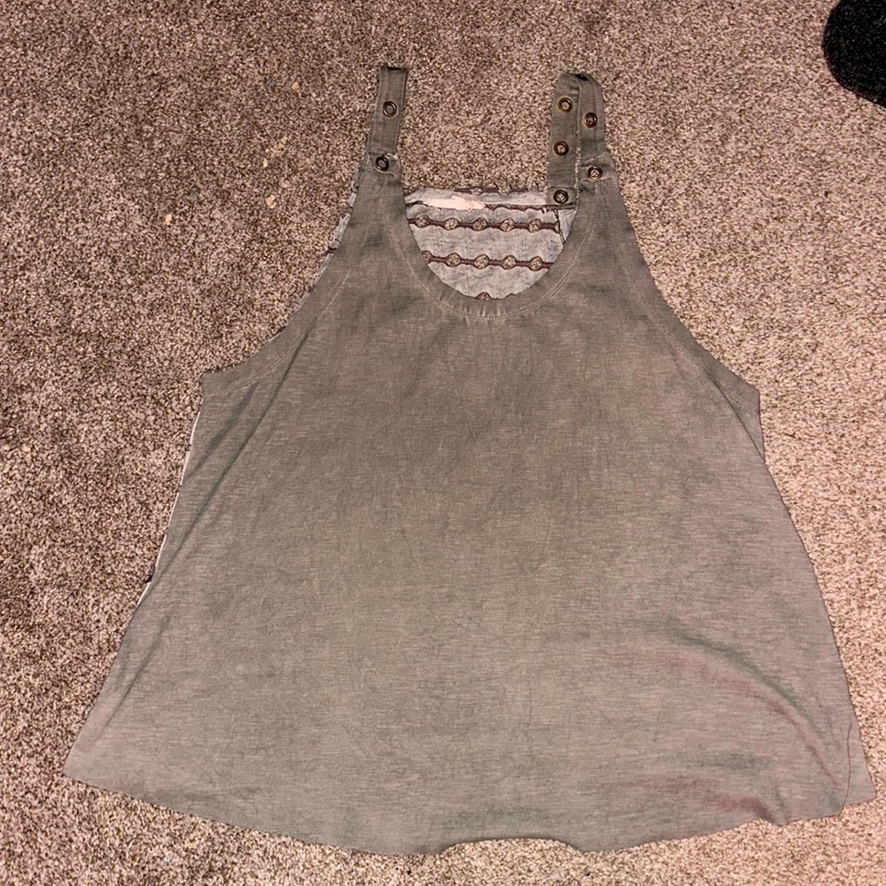 Awesome Buckle green tank with holes in the back as a pattern